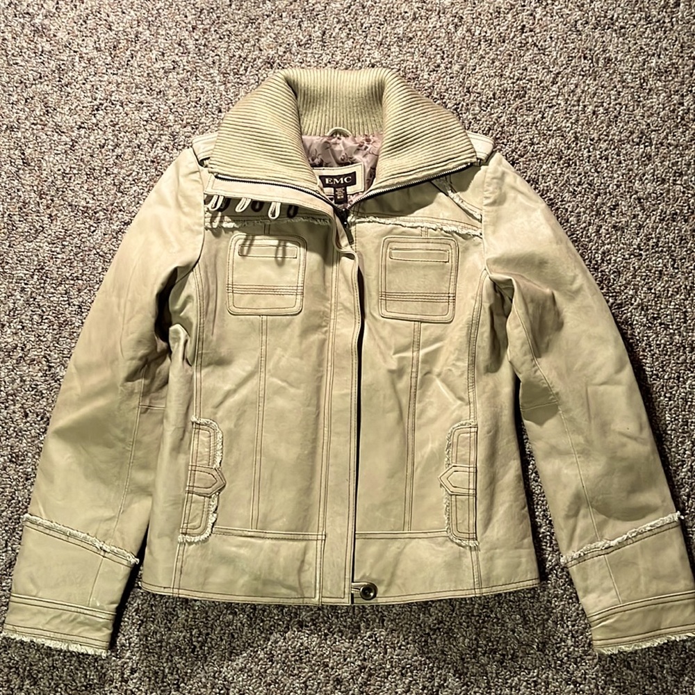 Light tan leather jacket. Excellent condition, never worn!